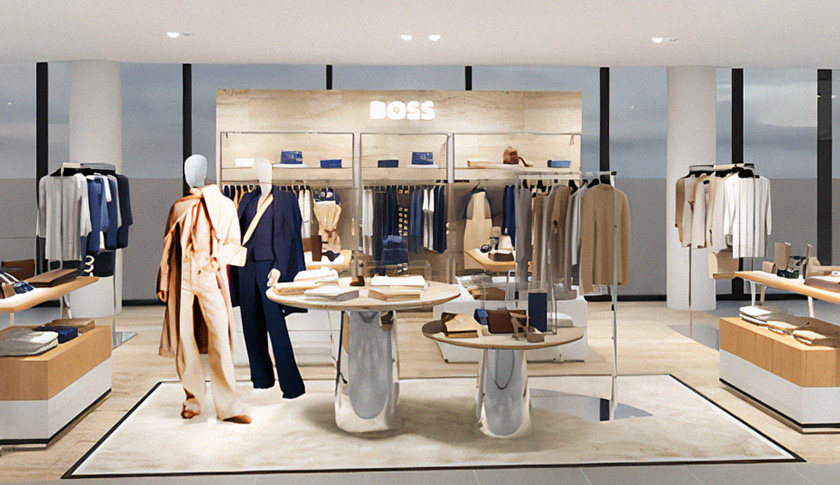 Entrance area of a clothing store with the BOSS logo in the Background (Photo)