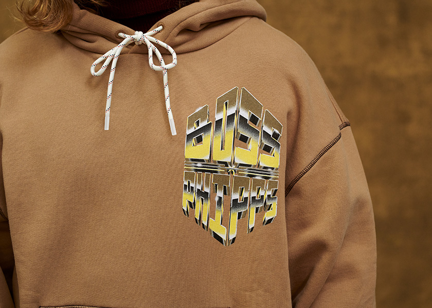 Powerful Circles – Close-up eines Hoodies mit BOSS x PHIPPS Marke (Foto)